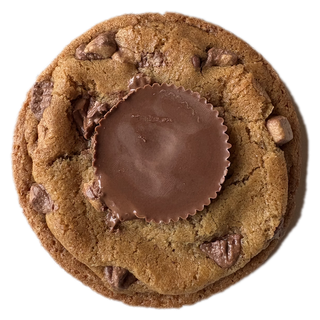 Brown butter cookie with a Reese&rsquo;s peanut butter cup pressed in the top